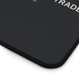 Black mouse pad with text on a white background