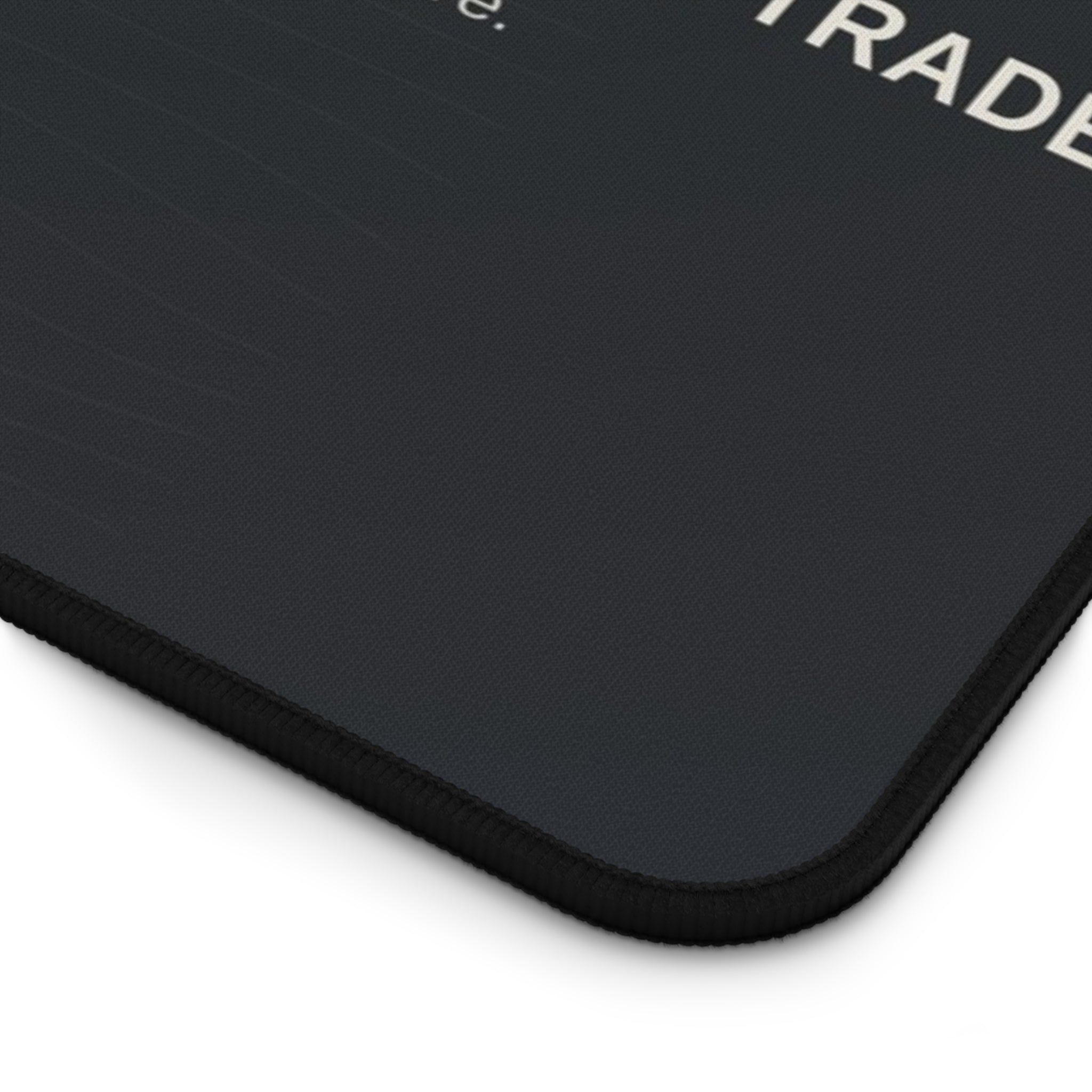 Black mouse pad with text on a white background