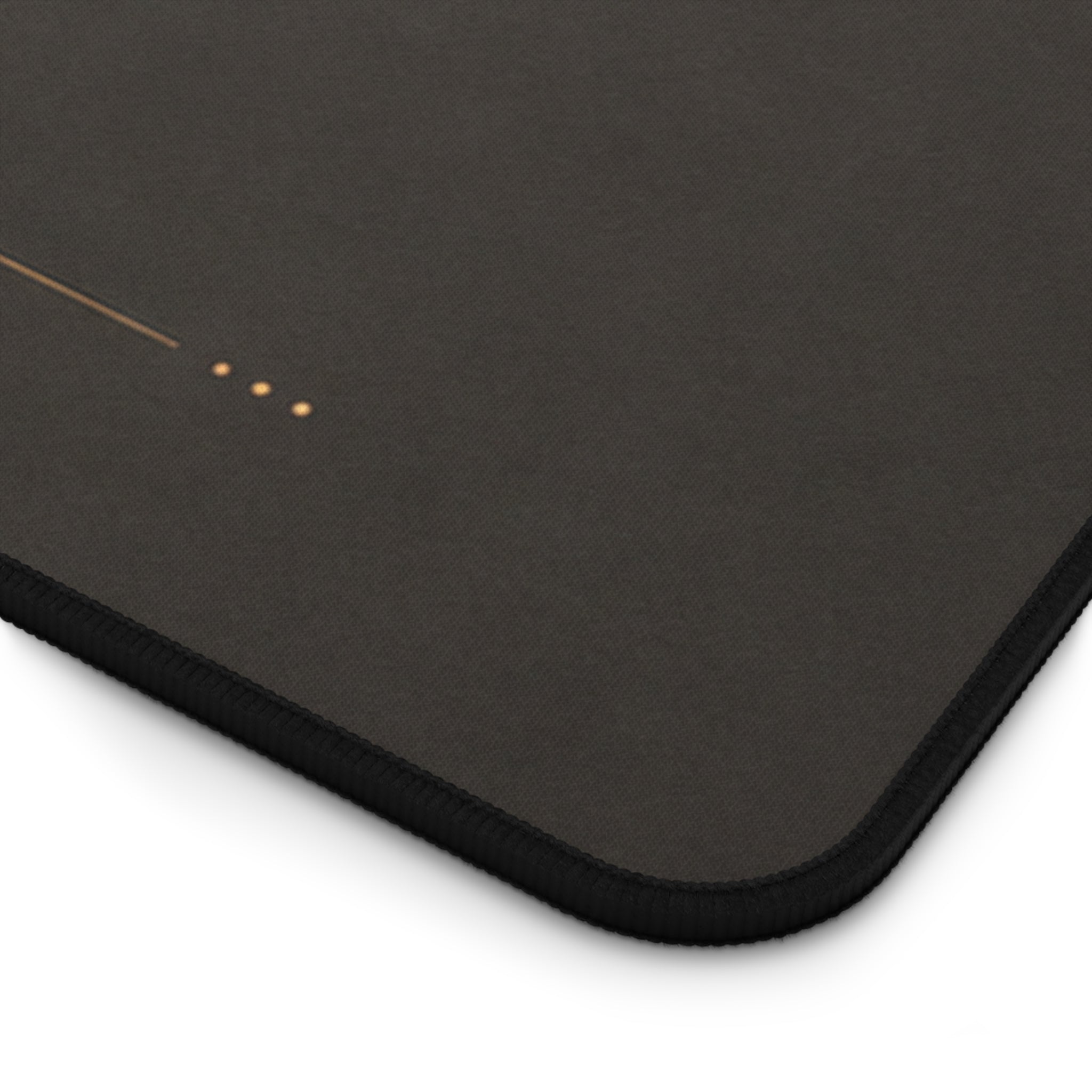 Dark charcoal office desk mat with bronze workspace details for focused professional setups